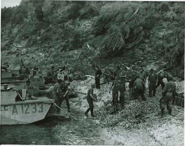 German Prisoners Unloading Canadian Landing Craft, le du Levant