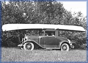 Harry Chestnut in his roadster - 
Harvey Studios