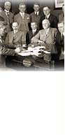 NAC, detail of C-024729, William Lyon Mackenzie, Signing of agreement,-Old Age Pension, Sask, May 19, 1928.