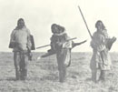 Three Copper Inuit men with fish near Bernard Harbour, Northwest Territories (Nunavut), © CMC/MCC, R.M. Anderson, 51002