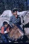 Alice Able with her brother Johnny holding muskrat skins : Gwitchin (Kutchin) adolescents and children of former chief Charlie Able, Old Crow, Yukon, ©CMC/MCC, Pre J.M. Mouchet, S2004-1342