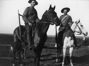 Boer War Picture, Two Canadian troopers of the South African Constabulary, evidently during or just after a tiring patrol. NAC C7987