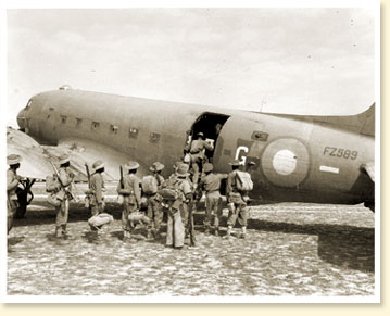 Troops boarding Douglas 'Dakota' aircraft of No.435 Squadron, RCAF, Burma, December 23, 1944. - Photo Credit:DND RCAF PL-6011, CWM Reference Photo Collection