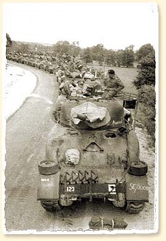 Allied tanks break out of Normandy to complete the liberation of Northern France, August 1944. - AN19900198-132