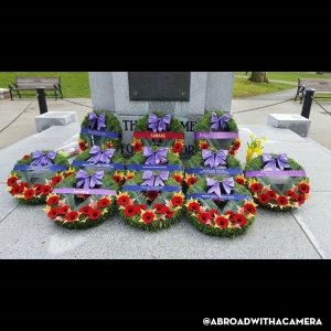 Wreaths laid at a monument