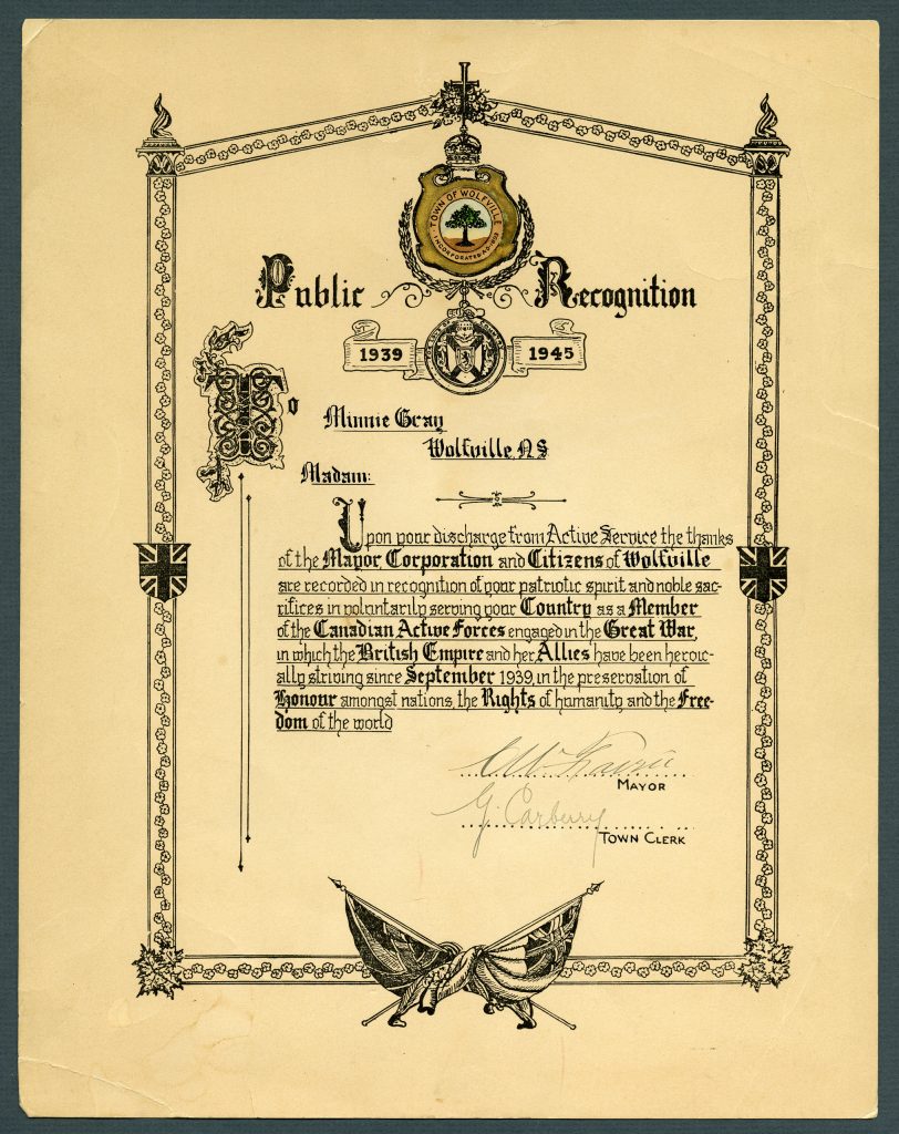 A certificate with a decorative border and the seal of the town of Wolfville.