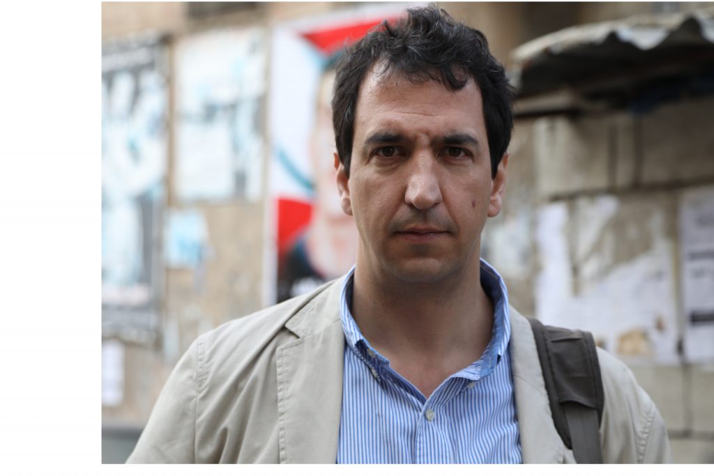 Image of man standing in street