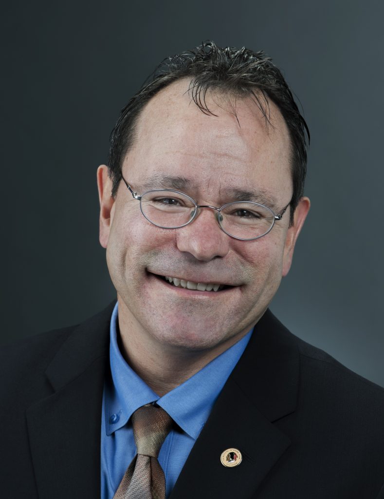 Headshot of John Moses