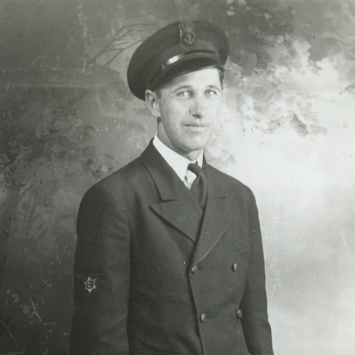 A man in a uniform from the Canadian War Museum in Ottawa posing for a photo.