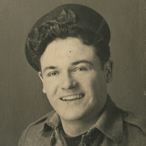 A man in a military uniform is smiling at the Canadian War Museum in Ottawa.