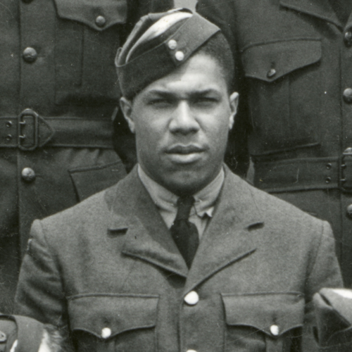 A black and white photo of a group of men in uniform at the Canadian War Museum in Ottawa.