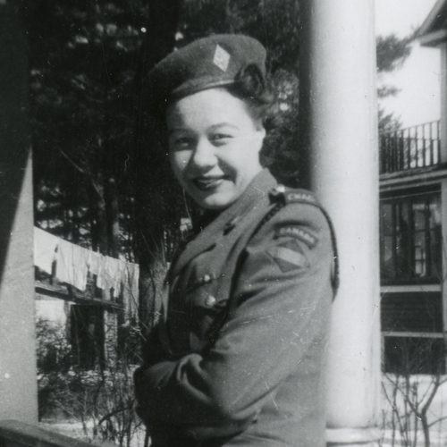A woman in military uniform is posing for a photo at the Canadian War Museum in Ottawa.