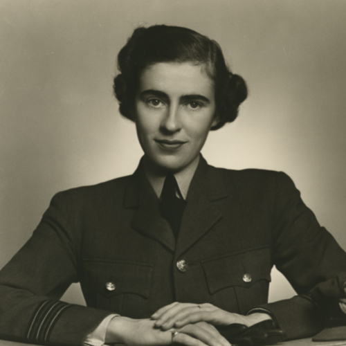 A woman in uniform is posing for a photo at the Canadian War Museum in Ottawa.