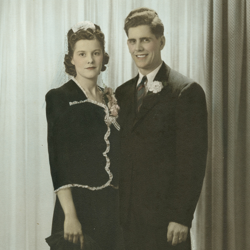 A man and woman posing for a picture at the Canadian War Museum in Ottawa.