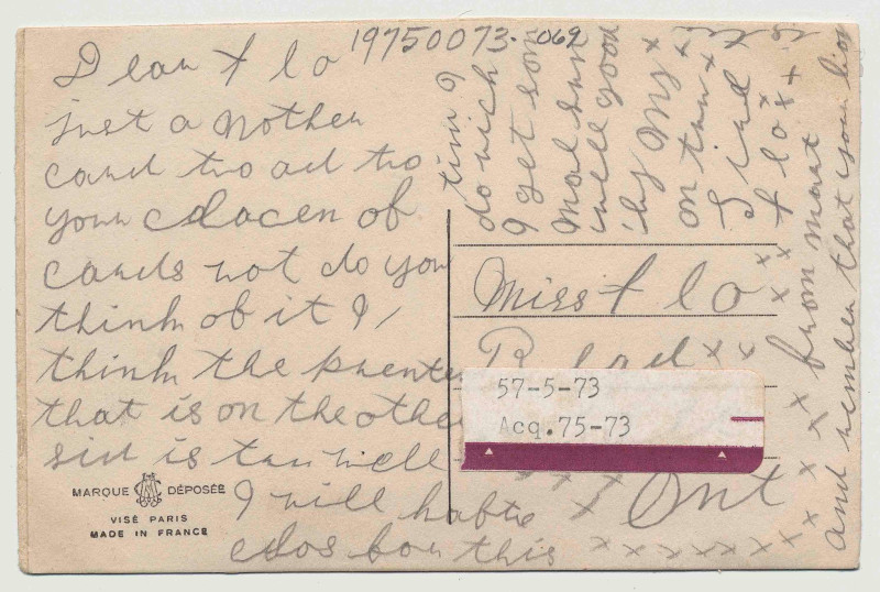 The back of a post card filled with handwriting in pencil.