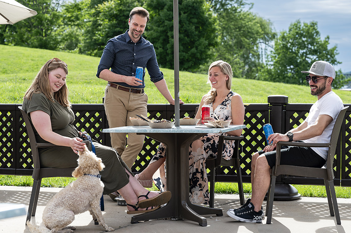 Four people enjoying a meal