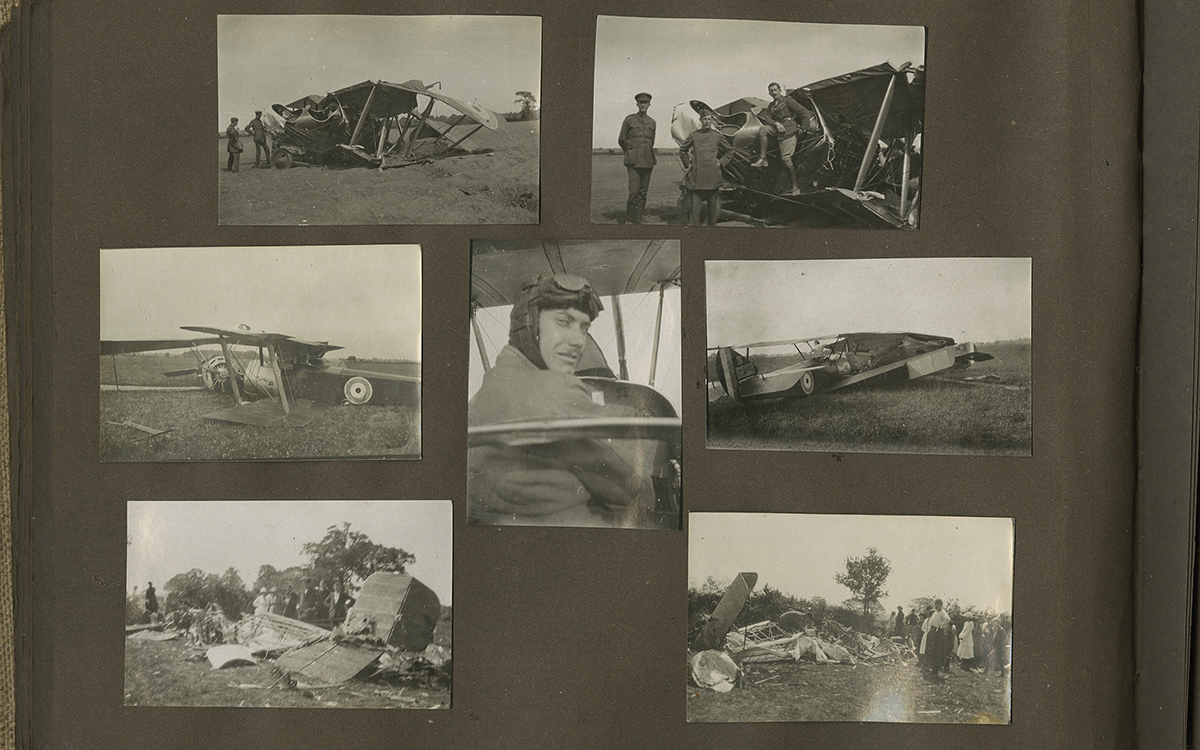 A page of a photo album featuring photographs of crashed planes.