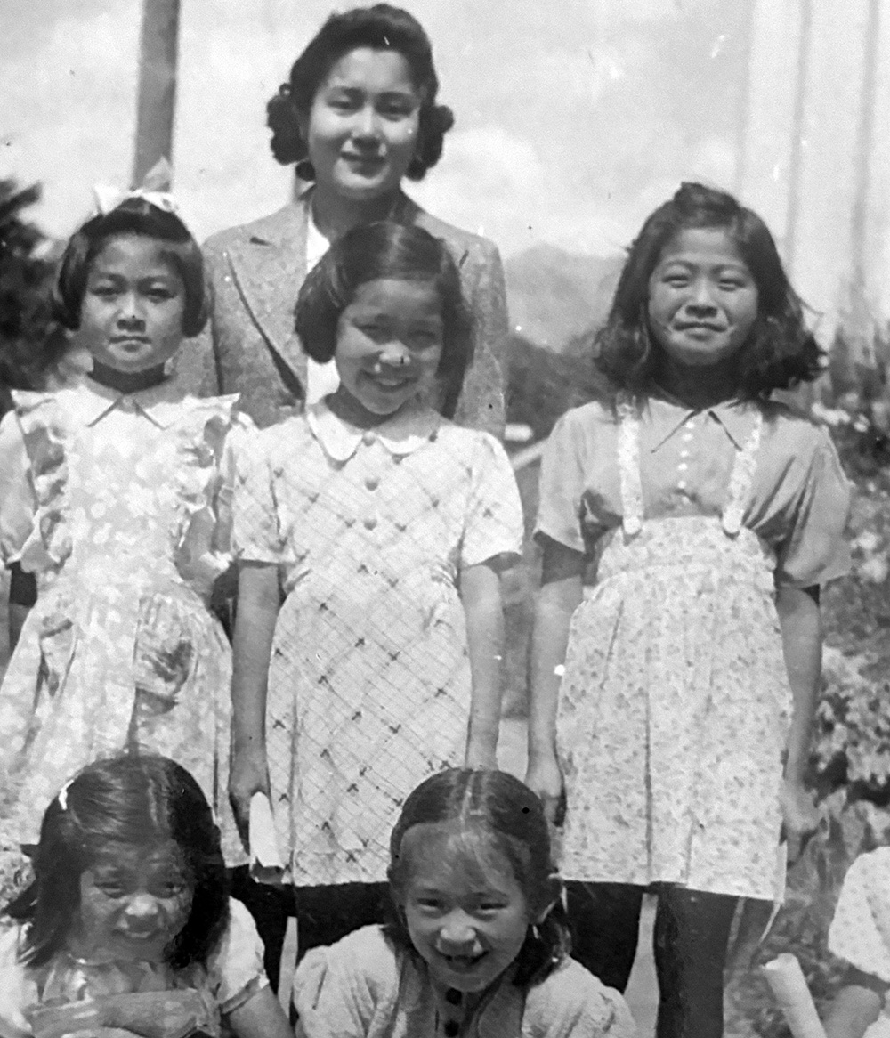 A woman with children