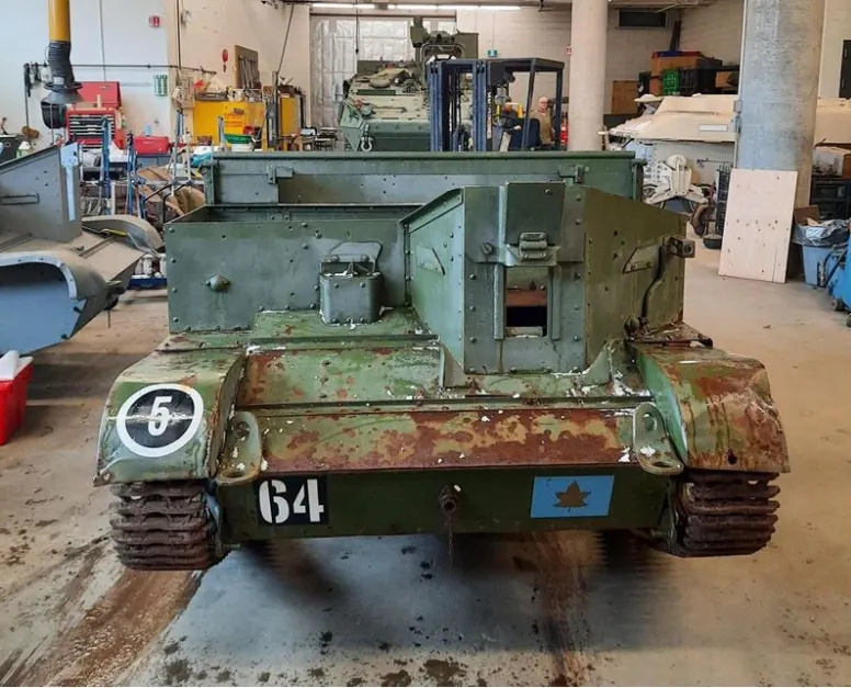 Front view of the Carrier showing extensive rusting and faded paint.